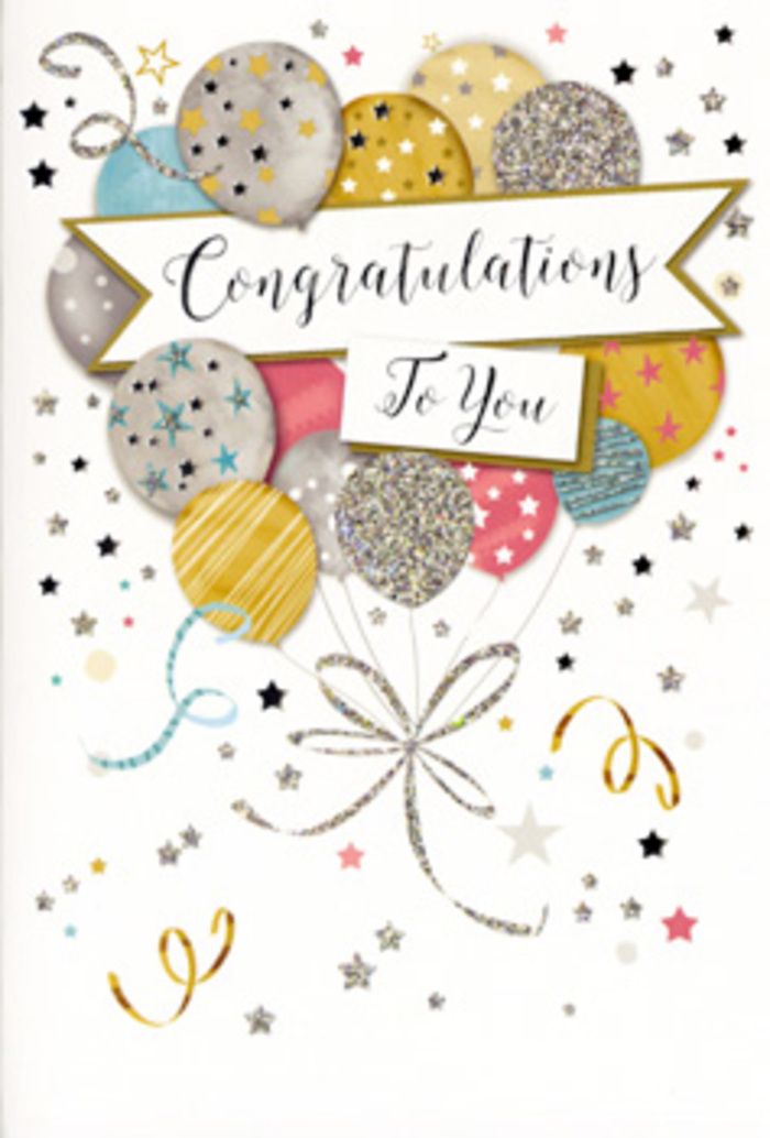 In this image, a refined congratulations card stands upright, its artwork transforming the flat surface into a graceful scene of celebration. The central focus is a generous bunch of illustrated balloons that appear to lift gently upward, as if caught in the softest of breezes that might drift along West Green's residential streets in early evening. The balloons vary in size and sit layered in front of one another, creating a sense of depth and movement. Their colours are harmonious and understated-muted gold, brushed silver, champagne, airy blue, blush rose, and cool grey-each adorned with patterns of twinkling stars, delicate stripes, or shimmering speckles that suggest fine glitter dusted across the surface. Emerging from the base of the cluster, long curling ribbons in metallic tones sweep and loop downward, visually tying the composition together the way a florist like Flowers West Green might bind a bouquet with elegant satin. Surrounding the balloons are scattered stars, dots of confetti, and coiled decorative lines, which drift across a pale, uncluttered background, echoing the joyful energy of a surprise party after a promotion or exam success. Running horizontally through the middle of the card is a stylised banner that appears gently unfurled, its softly shaded edges giving it a dimensional, ribbon-like quality. On this banner, the words Congratulations To You are written in graceful, flowing script that carries a note of heartfelt pride. The overall atmosphere of the design is uplifting yet tasteful, ideal for pairing with fresh flowers delivered across the West Green area when you want to acknowledge someone's achievement with both style and sincere emotion.
